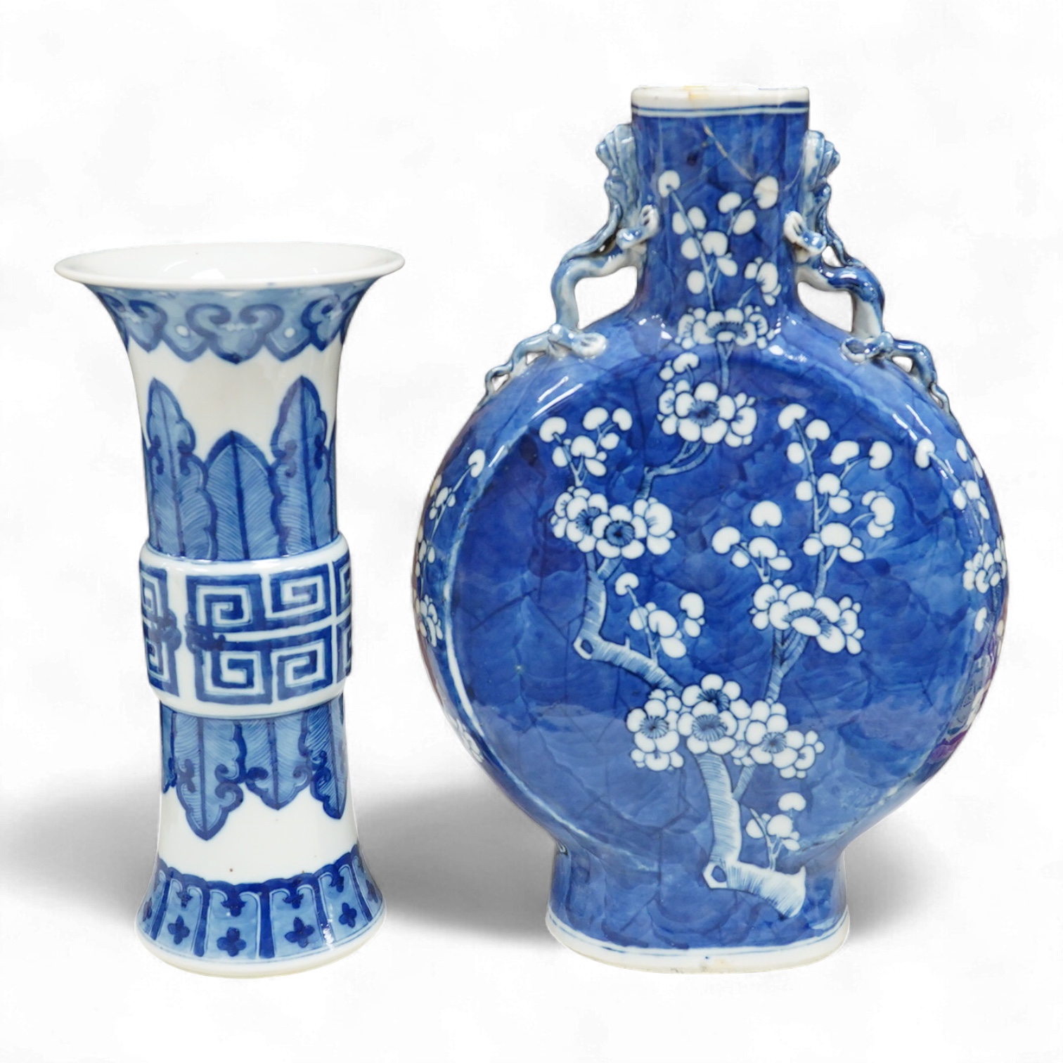 A Chinese blue and white prunus flower moon-flask and a Gu vase, largest 30cm high